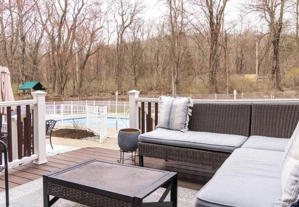 a view of a patio with a table chairs and a table
