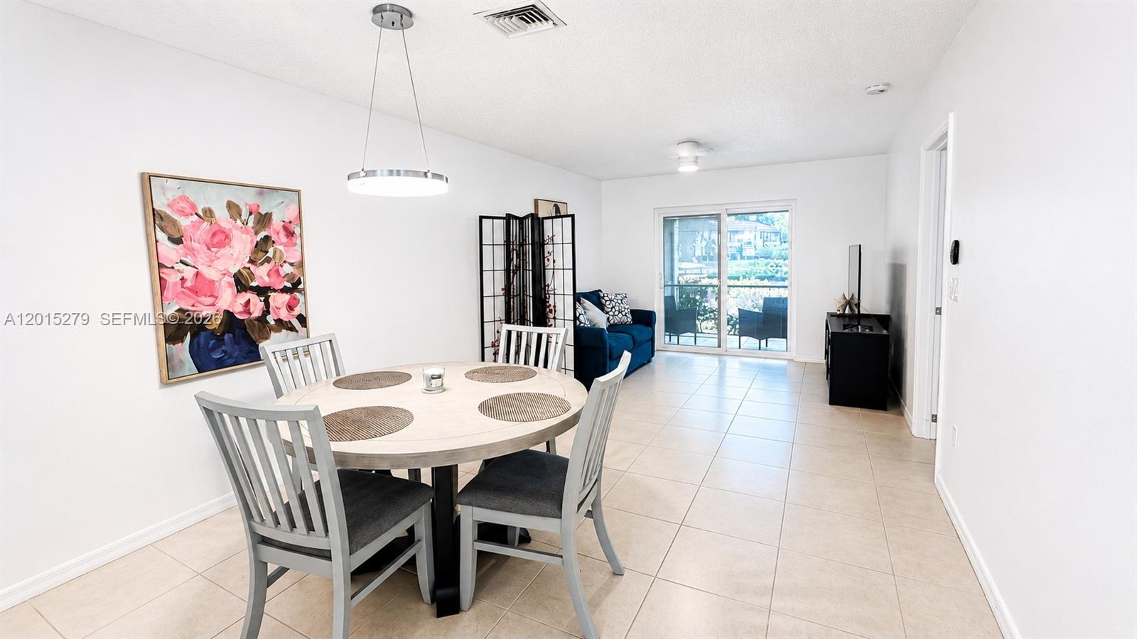 5339 Treetops Drive, Unit 5339 Naples, FL 34113 - Photo 2 of 20 a view of a dining room with furniture