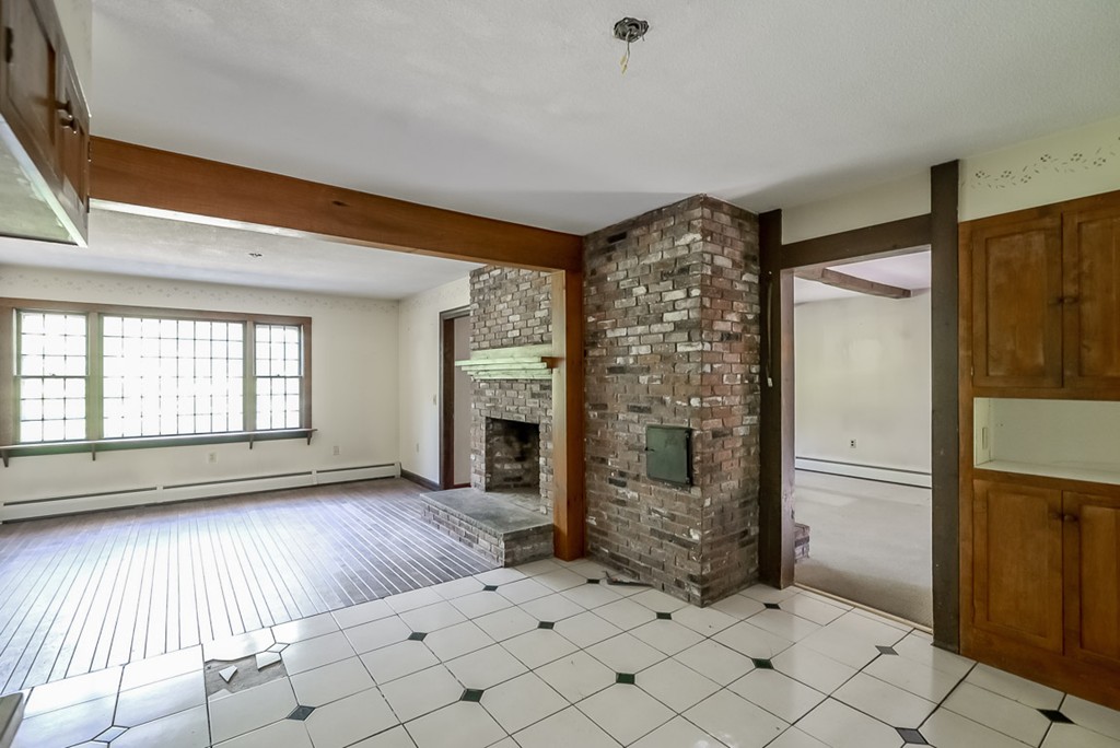 413 Harvard Road Bolton, MA 01740 - Photo 7 of 25 an empty room with windows