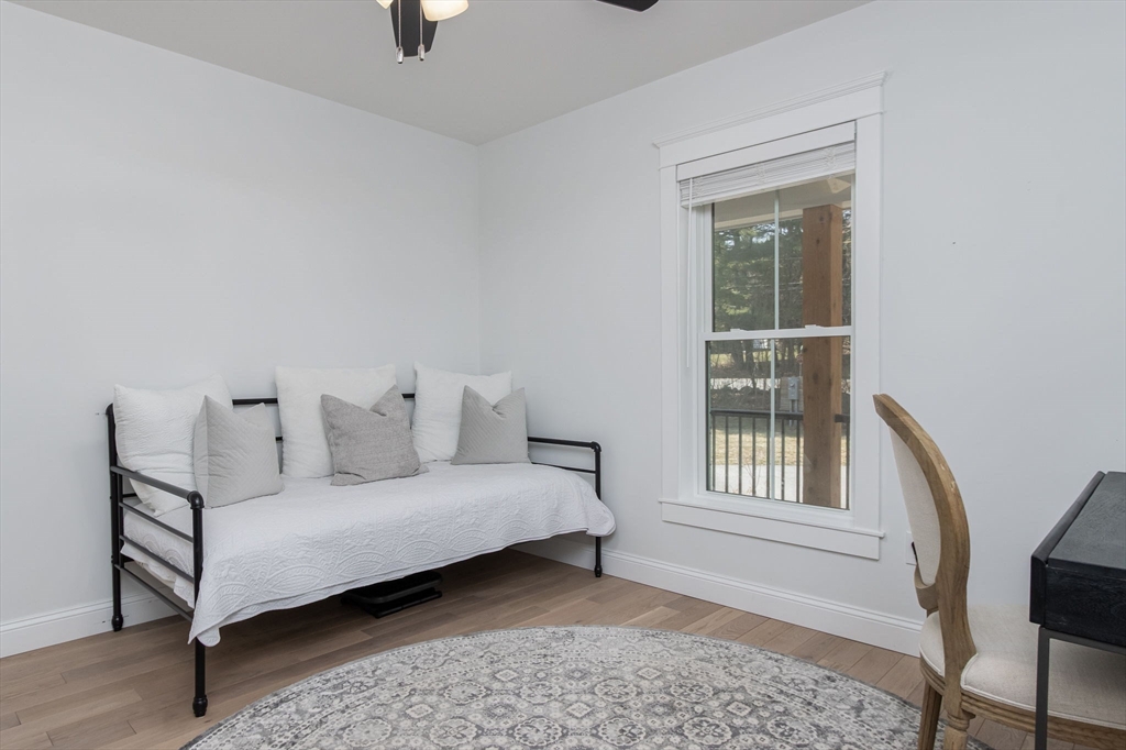 5 Mill Street Dunstable, MA 01827 - Photo 17 of 42 a living room with furniture and a window