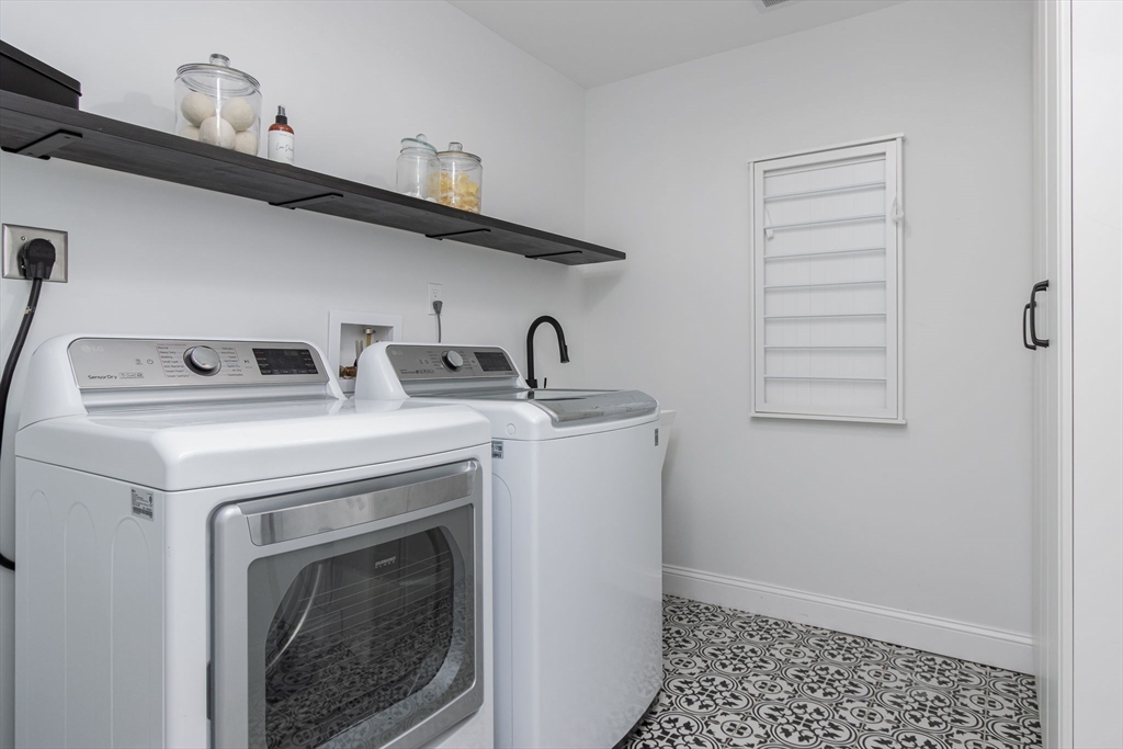 5 Mill Street Dunstable, MA 01827 - Photo 29 of 42 a utility room with dryer and washer