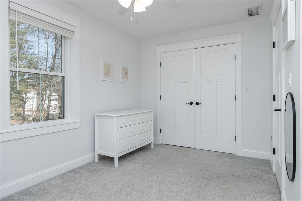 5 Mill Street Dunstable, MA 01827 - Photo 33 of 42 a view of room with window and a ceiling fan