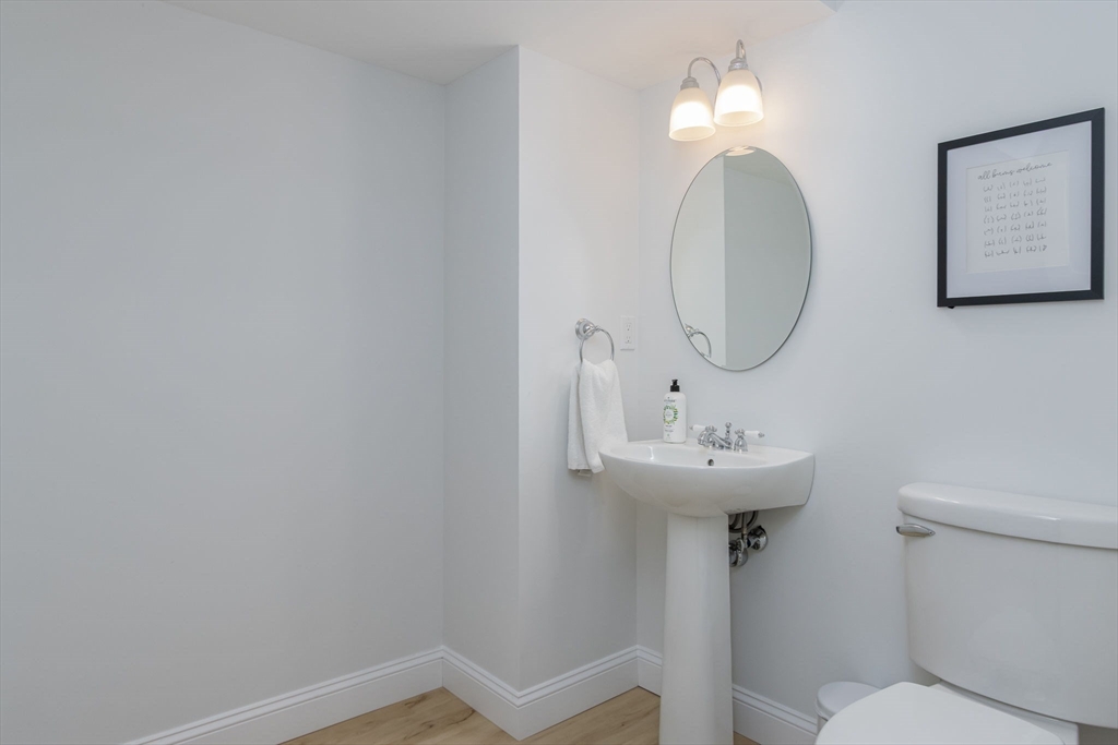 5 Mill Street Dunstable, MA 01827 - Photo 36 of 42 a bathroom with a sink mirror and toilet