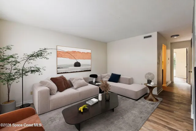 a bedroom with a bed and a television