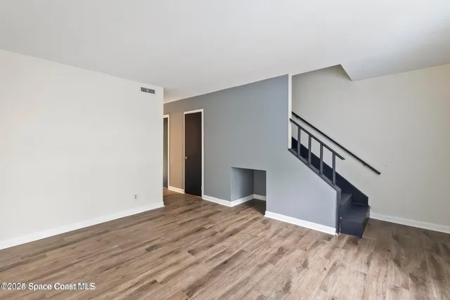 a kitchen with a sink stove and refrigerator