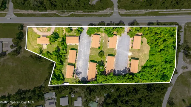 a view of swimming pool from a balcony