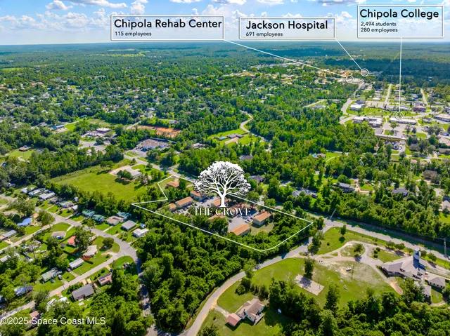 a view of a street with a park