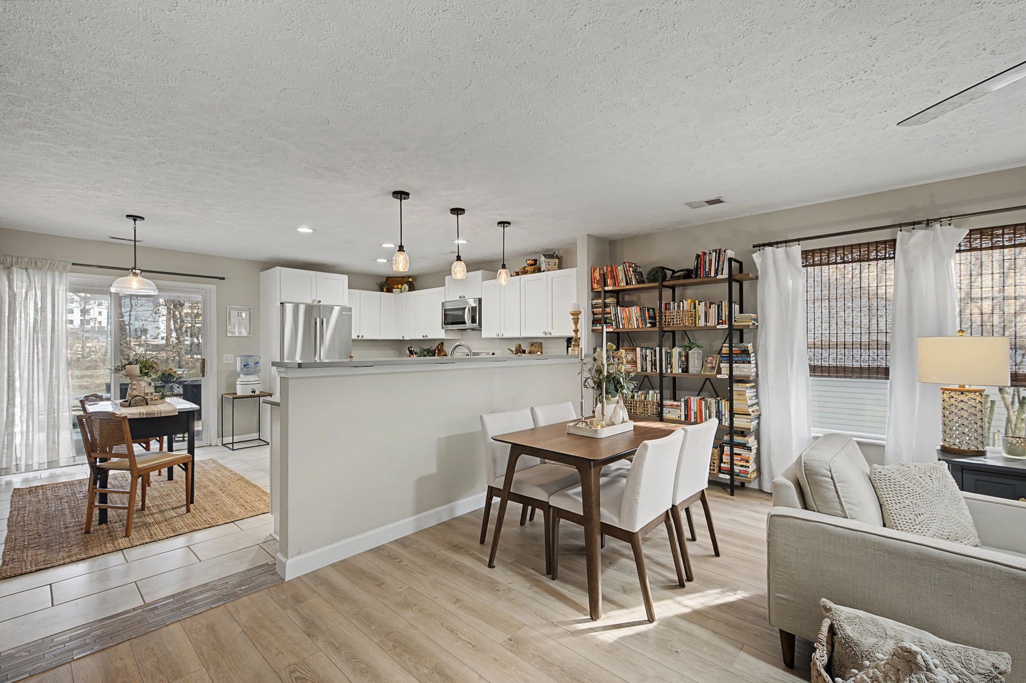 1038 Lexington Farms Drive Spring Hill, TN 37174 - Photo 12 of 34 a dining room with furniture and wooden floor