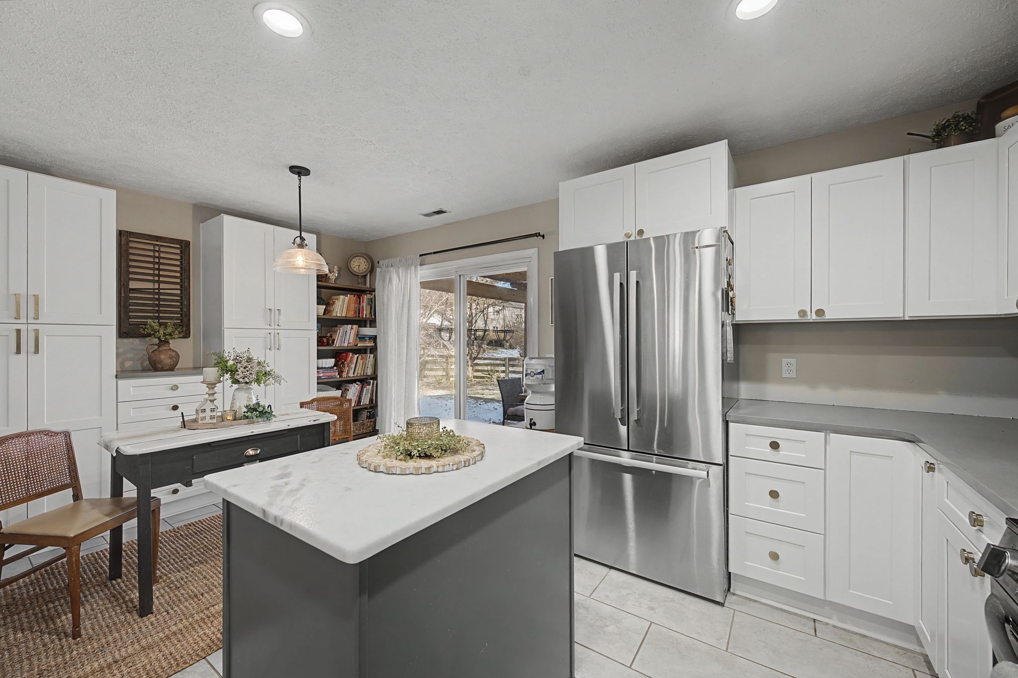 1038 Lexington Farms Drive Spring Hill, TN 37174 - Photo 15 of 34 a kitchen with appliances cabinets and furniture