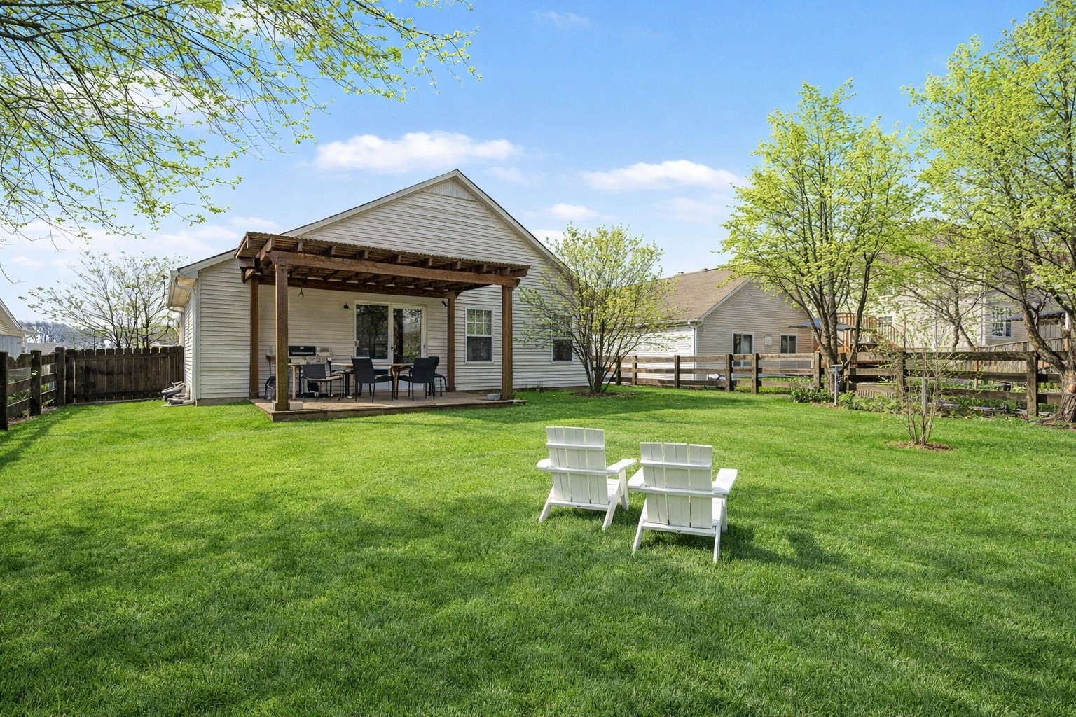 1038 Lexington Farms Drive Spring Hill, TN 37174 - Photo 27 of 34 a view of a house with a big yard