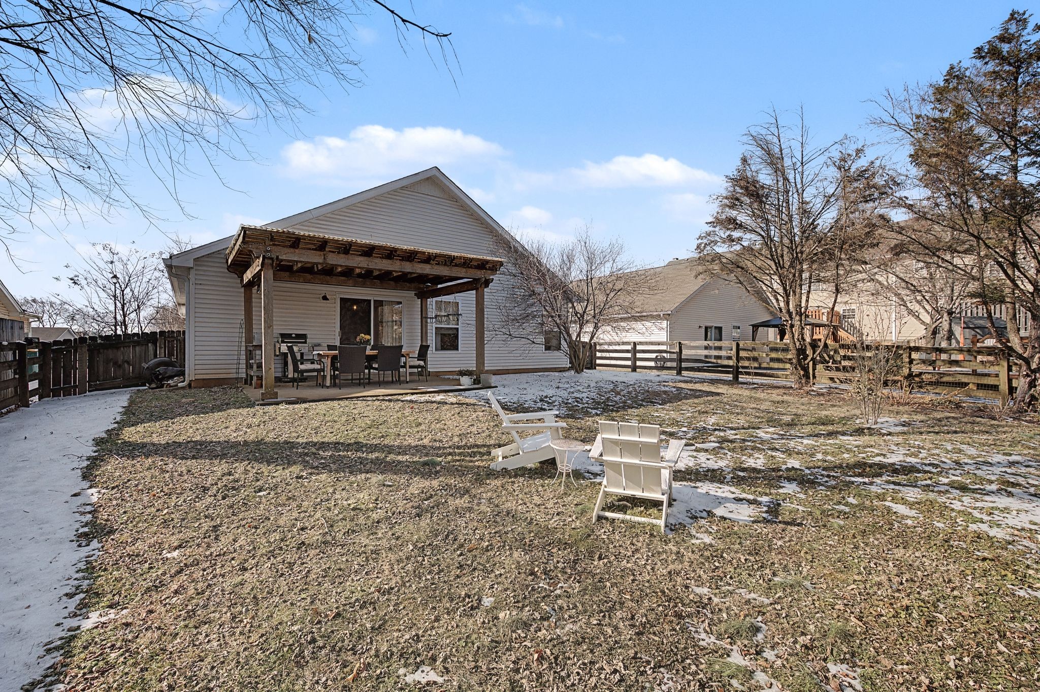 1038 Lexington Farms Drive Spring Hill, TN 37174 - Photo 28 of 34 a front view of a house with a yard