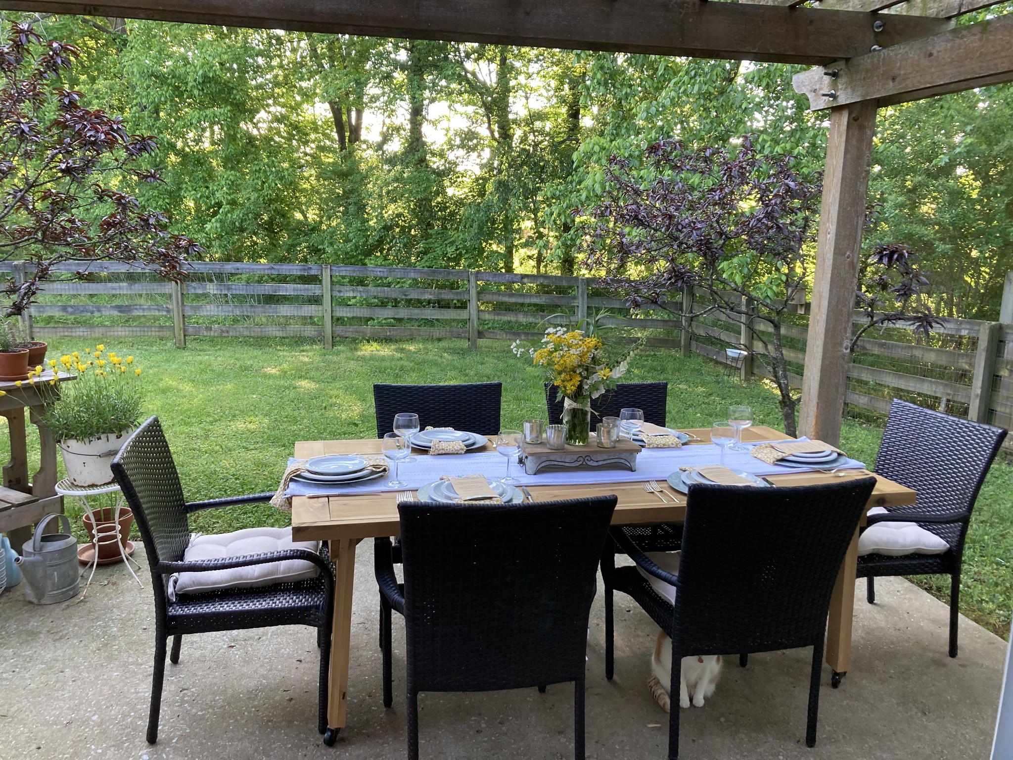 1038 Lexington Farms Drive Spring Hill, TN 37174 - Photo 30 of 34 a view of a dining table and chairs in a yard