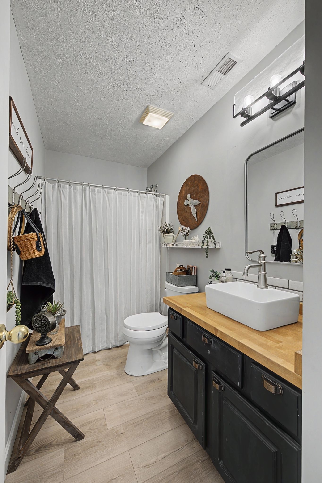 1038 Lexington Farms Drive Spring Hill, TN 37174 - Photo 8 of 34 a bathroom with a double vanity sink mirror and toilet