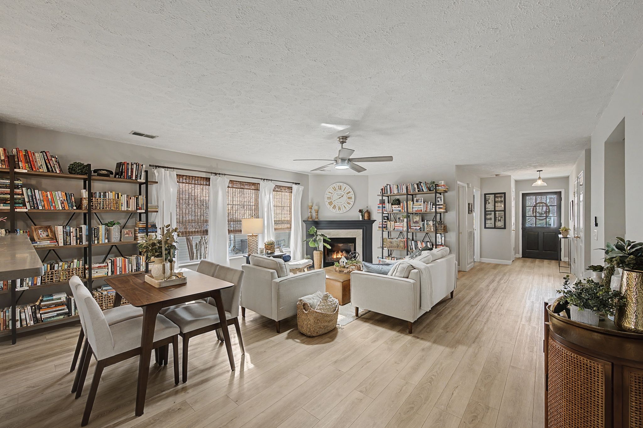 1038 Lexington Farms Drive Spring Hill, TN 37174 - Photo 10 of 34 a living room with fireplace furniture and a wooden floor