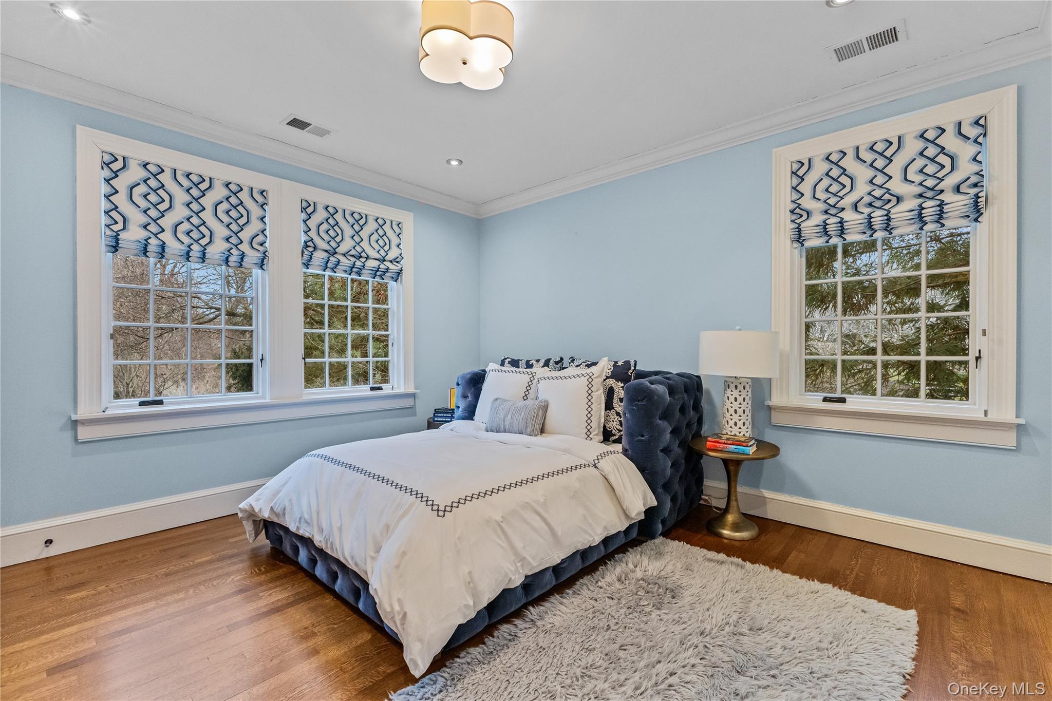 19 Park Drive South Rye, NY 10580 - Photo 32 of 42 Bedroom featuring detailed molding and wood finished floors.