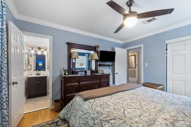a view of a livingroom with furniture and a window