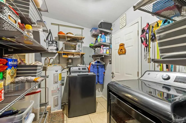 a outdoor living space with patio furniture and potted plants