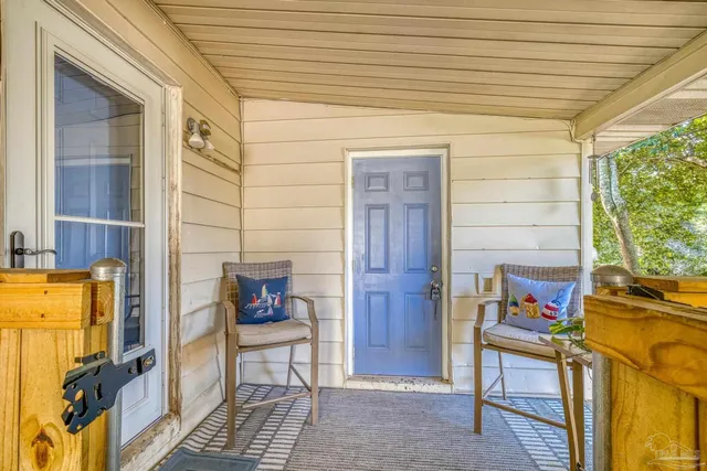 a outdoor dining space with furniture