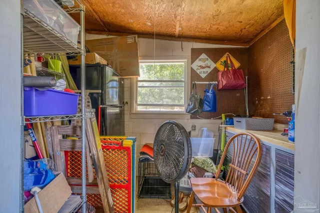 a backyard of a house with outdoor seating