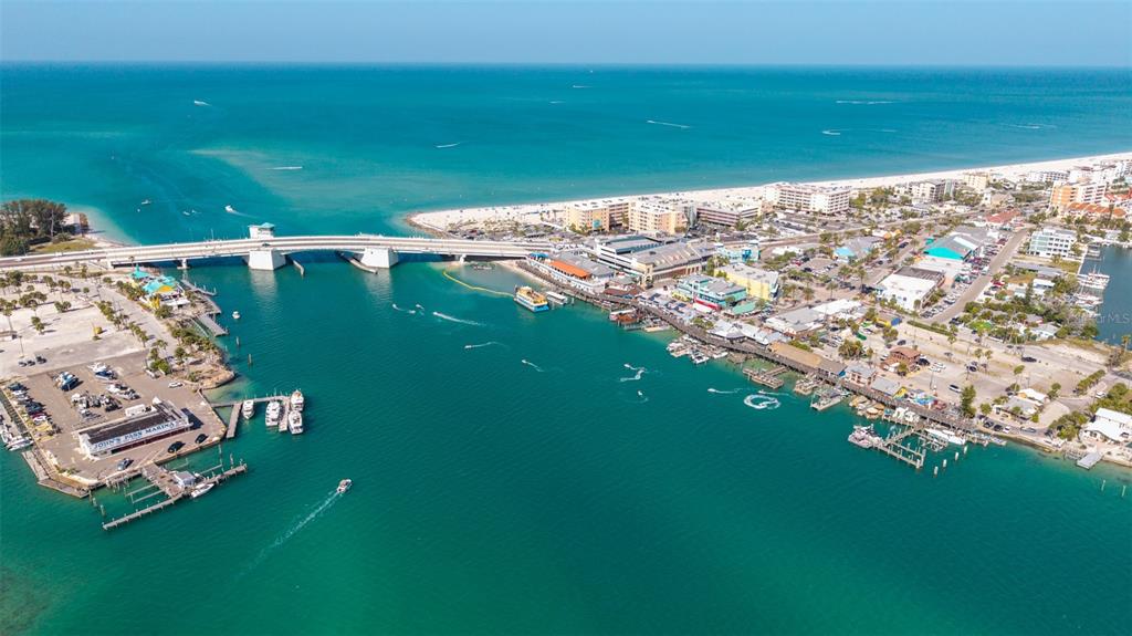 13304 Gulf Boulevard Madeira Beach, FL 33708 - Photo 12 of 13 a view of a lake with a big yard