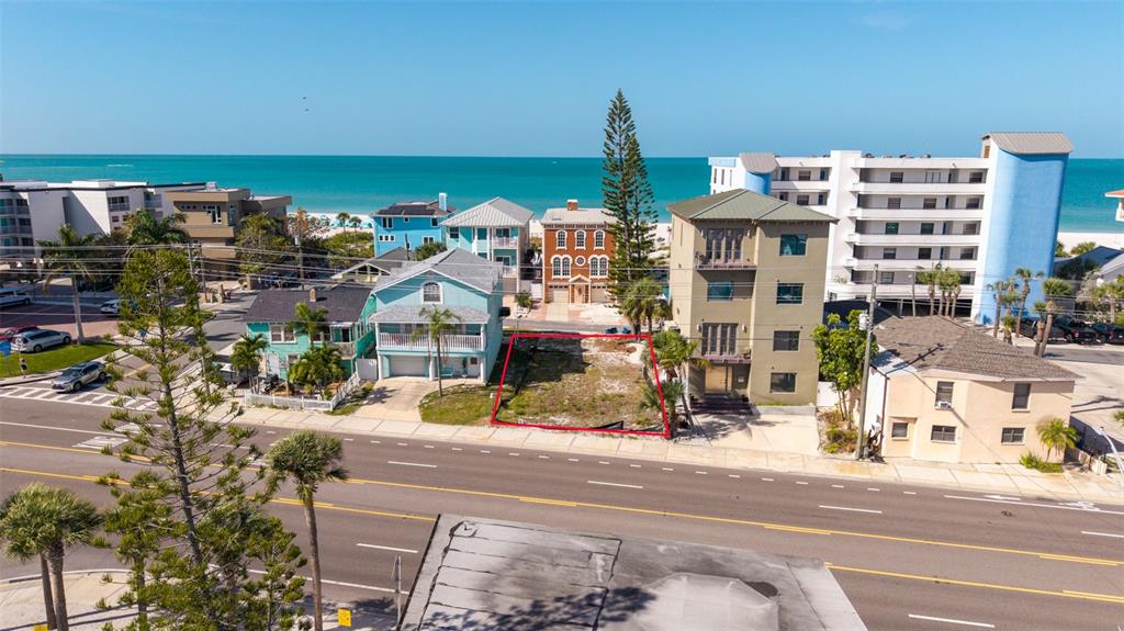 13304 Gulf Boulevard Madeira Beach, FL 33708 - Photo 2 of 13 a view of building with street view