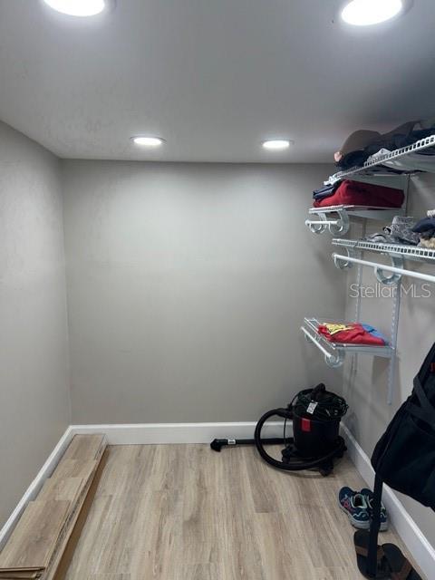 6837 Flicker Lane Hudson, FL 34667 - Photo 16 of 28 a room with a hard wood floor and a sink