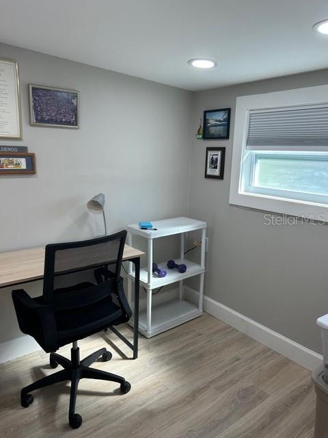 6837 Flicker Lane Hudson, FL 34667 - Photo 17 of 28 a view of a livingroom with furniture and windows