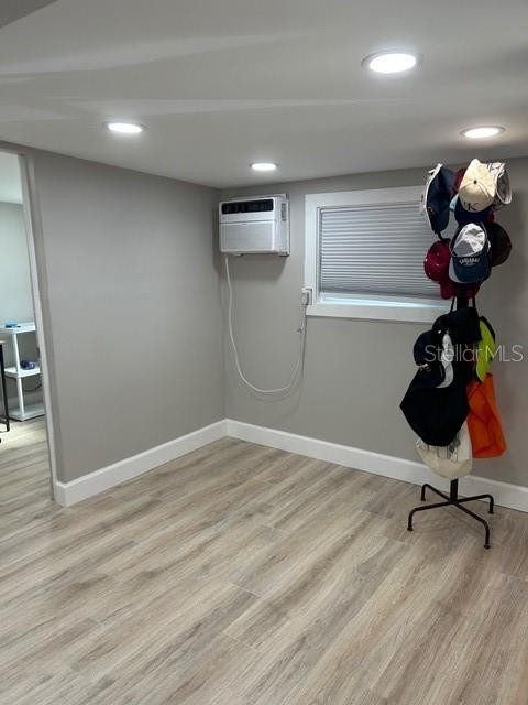 6837 Flicker Lane Hudson, FL 34667 - Photo 18 of 28 a view of a room with wooden floor and fan