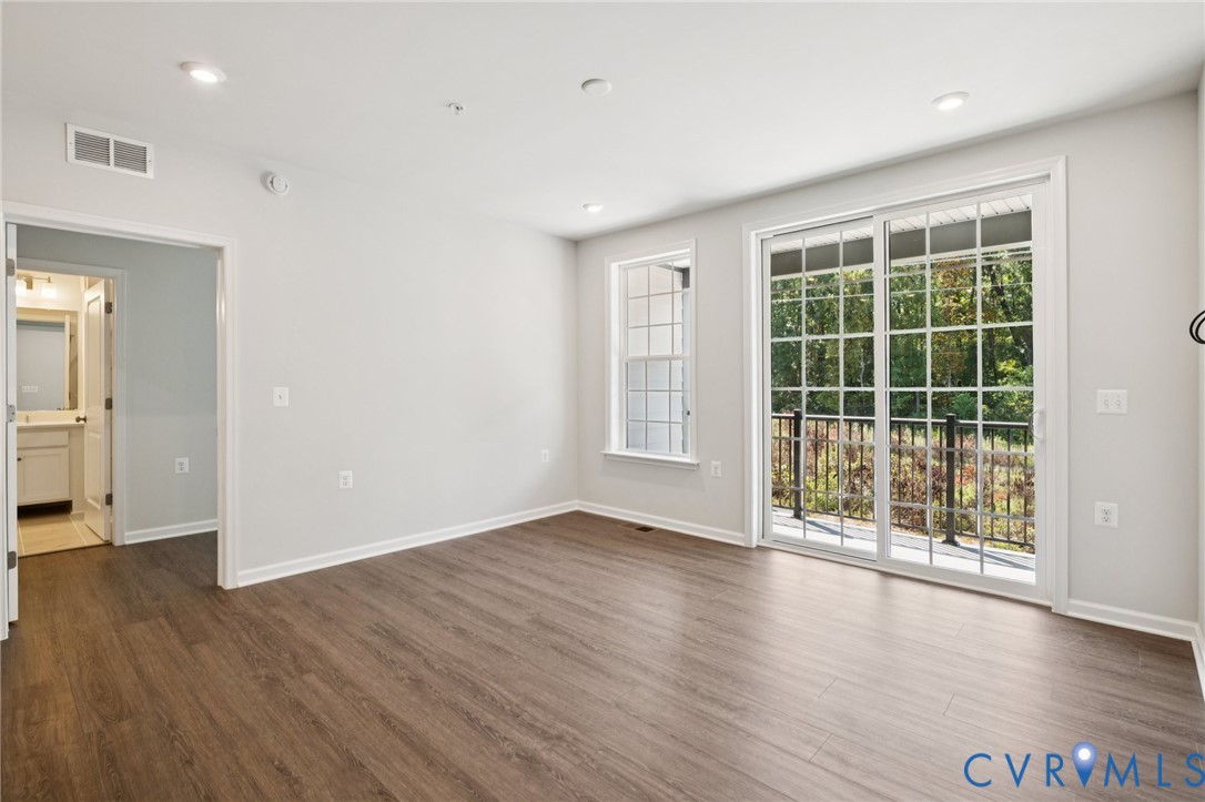 13239 Garland Lane Midlothian, VA 23114 - Photo 13 of 48 wooden floor in an empty room with a window