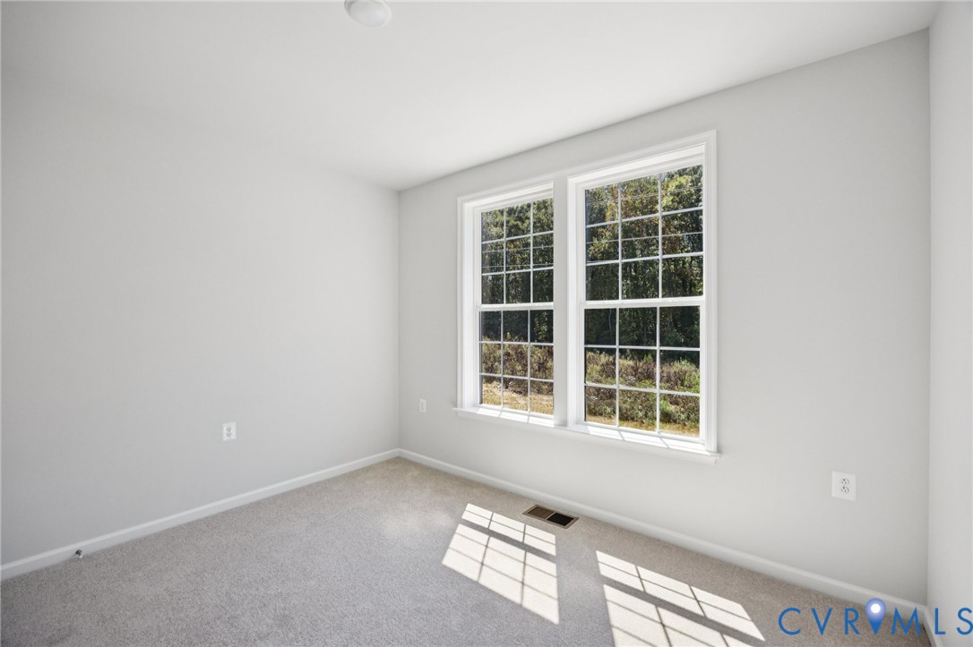 13239 Garland Lane Midlothian, VA 23114 - Photo 16 of 48 a view of an empty room with a window