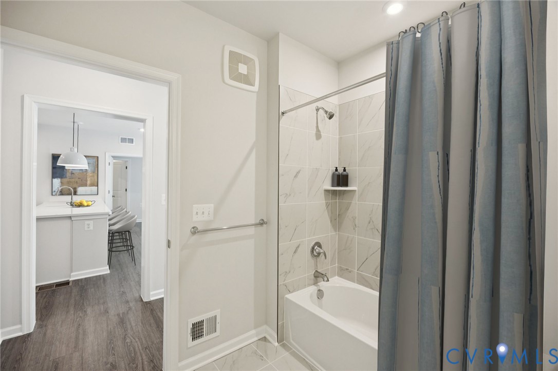 13239 Garland Lane Midlothian, VA 23114 - Photo 21 of 48 a bathroom with a shower a sink and a mirror