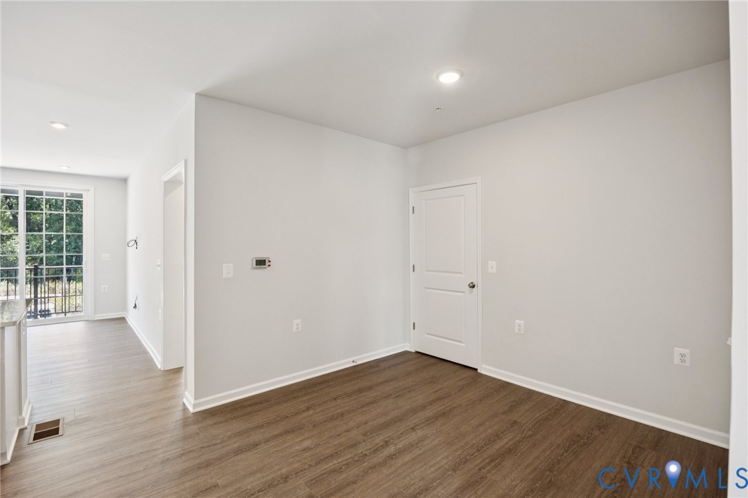 13239 Garland Lane Midlothian, VA 23114 - Photo 22 of 48 wooden floor in an empty room with a window
