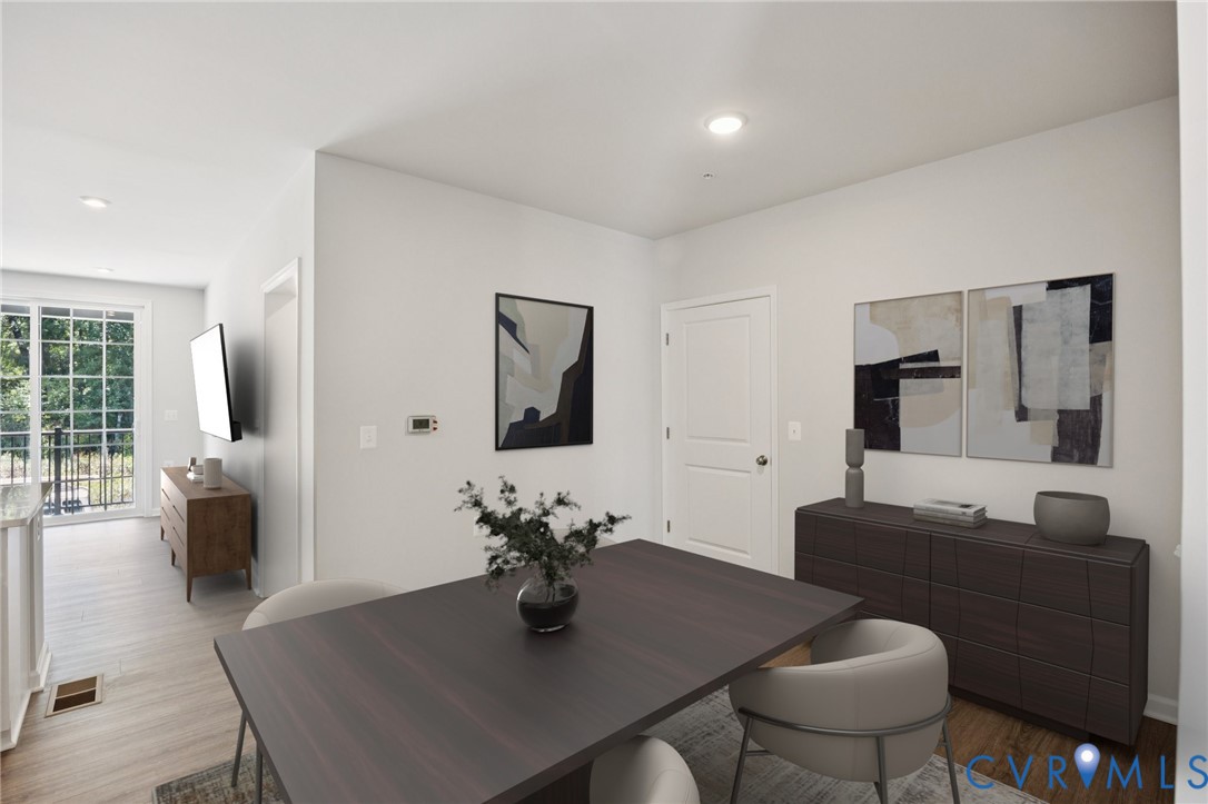 13239 Garland Lane Midlothian, VA 23114 - Photo 23 of 48 a dining room with furniture and wooden floor