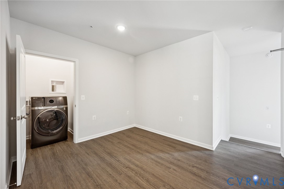 13239 Garland Lane Midlothian, VA 23114 - Photo 26 of 48 a view of a storage & utility room with wooden floor