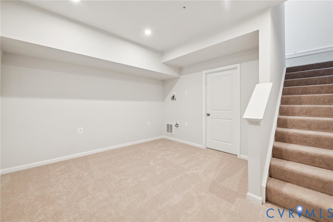 13239 Garland Lane Midlothian, VA 23114 - Photo 27 of 48 a view of an empty room with stairs