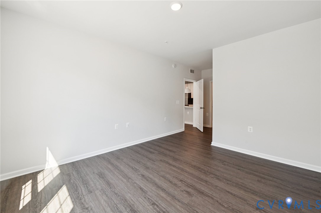 13239 Garland Lane Midlothian, VA 23114 - Photo 31 of 48 a view of an empty room with wooden floor