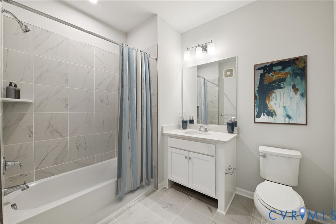 13239 Garland Lane Midlothian, VA 23114 - Photo 35 of 48 a bathroom with a toilet a sink and a bathtub