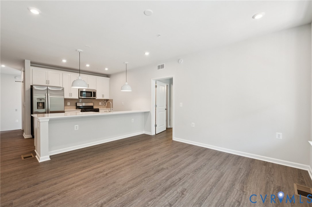 13239 Garland Lane Midlothian, VA 23114 - Photo 10 of 48 a view of kitchen with wooden floor