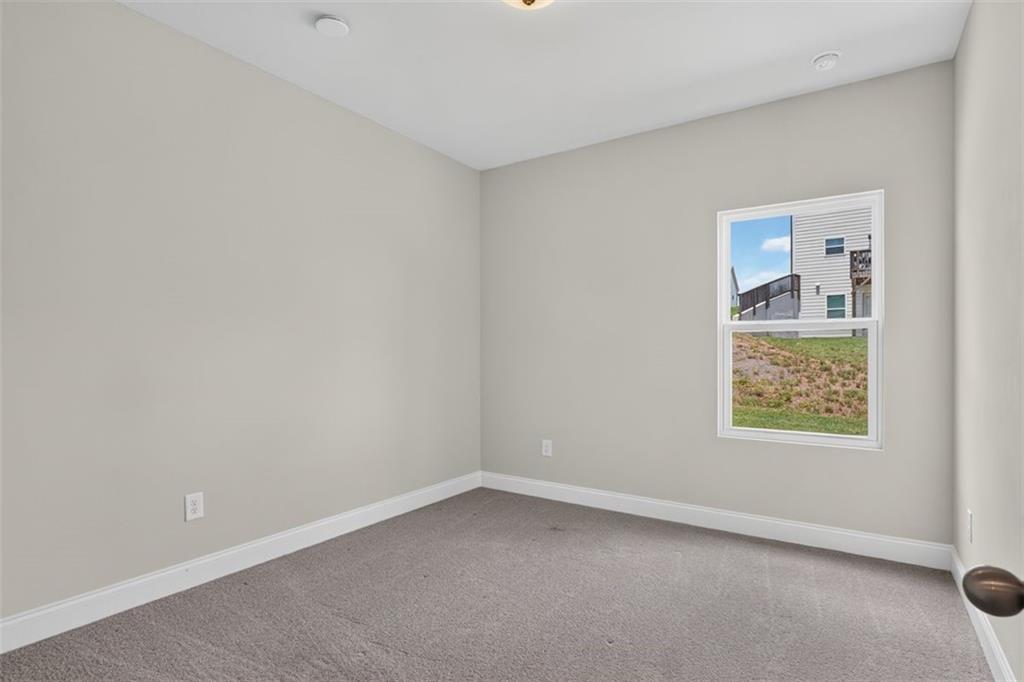 107 Ledgemont Way Acworth, GA 30101 - Photo 19 of 57 an empty room with a window