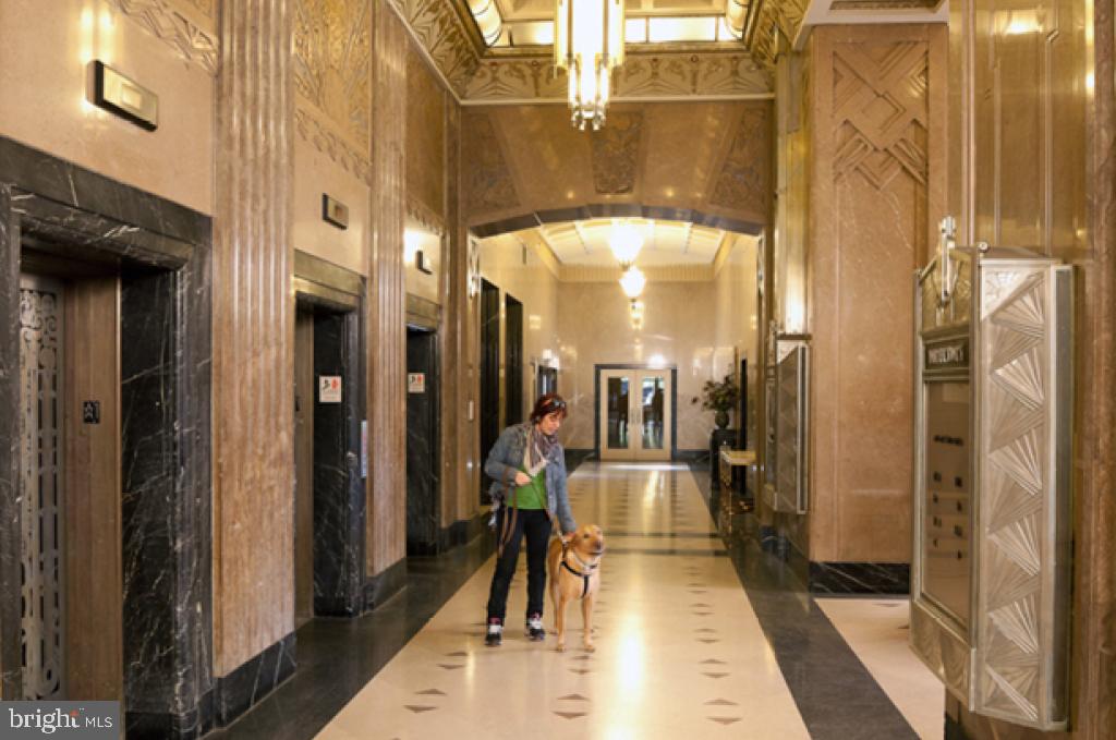 230-38 North 21st Street, Unit 409 Philadelphia, PA 19103 - Photo 12 of 17 a bathroom with a glass shower door