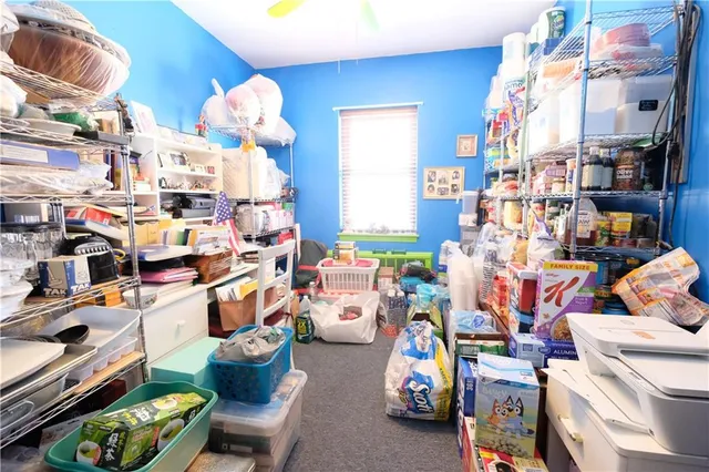 a view of living room filled with furniture