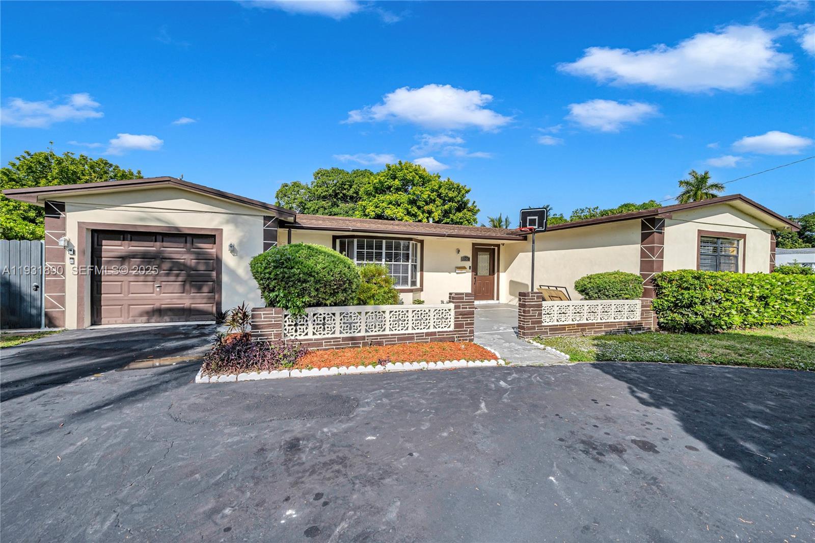 a view of house with outdoor space and swimming pool