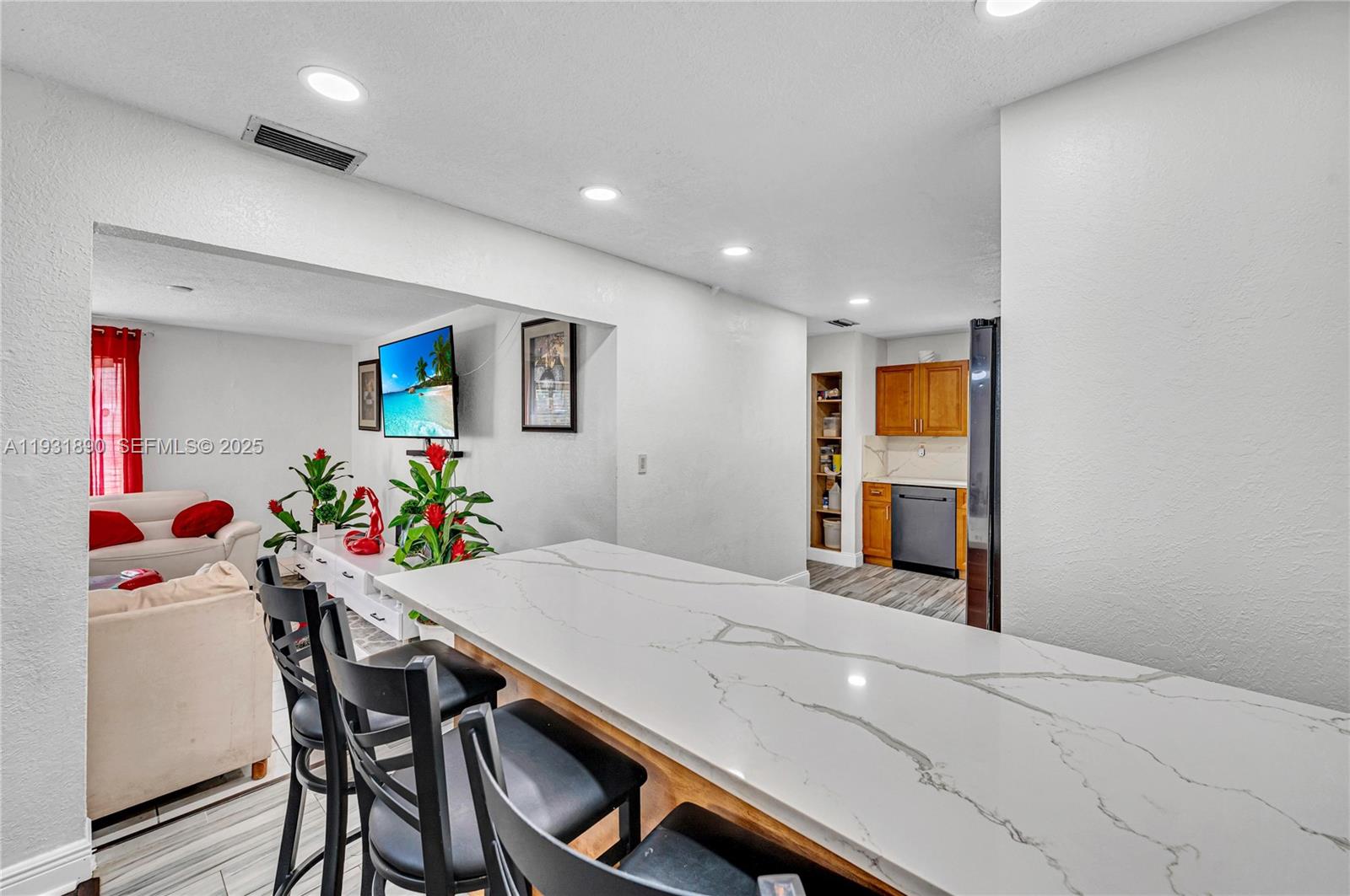 4751 Northwest 5th Court Plantation, FL 33317 - Photo 12 of 34 a view of a dining room with furniture