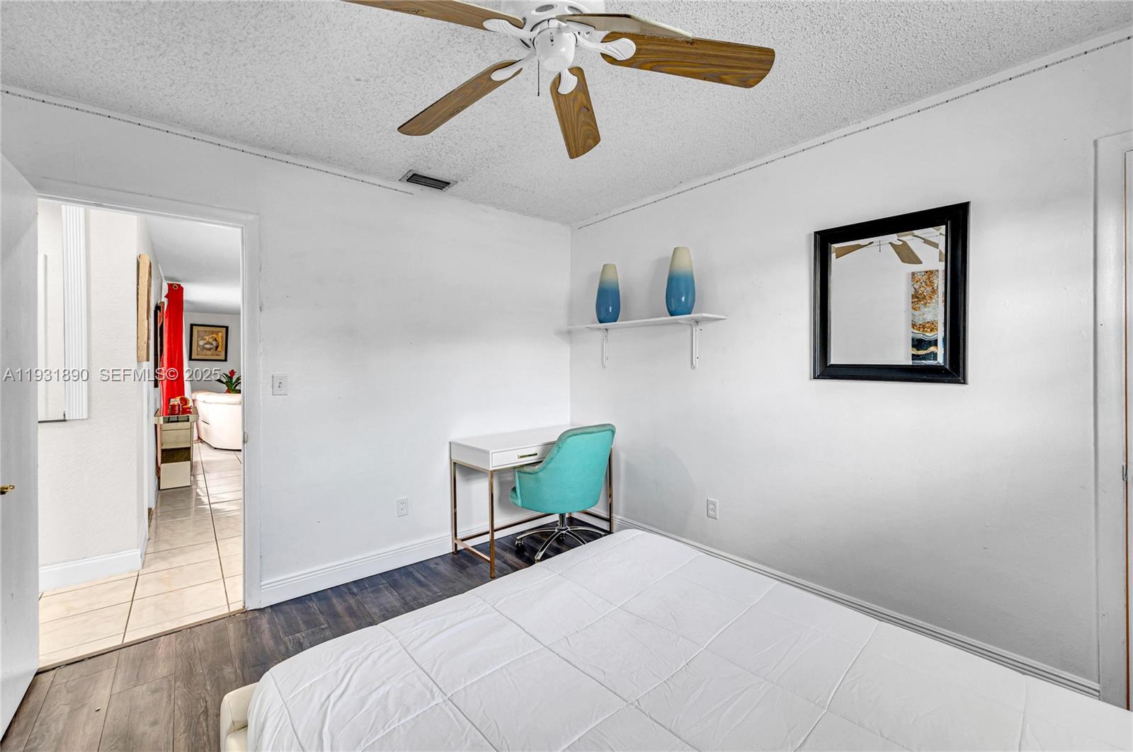 4751 Northwest 5th Court Plantation, FL 33317 - Photo 24 of 34 a bedroom with a bed and a window