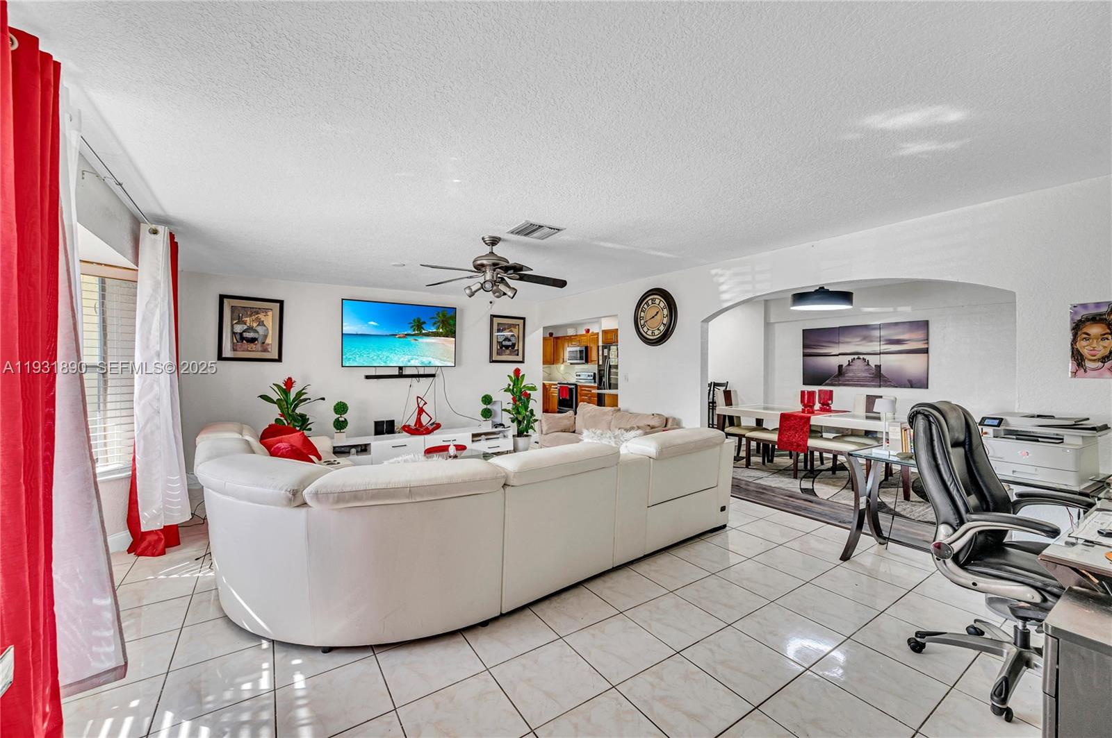 4751 Northwest 5th Court Plantation, FL 33317 - Photo 4 of 34 a living room with furniture and a flat screen tv