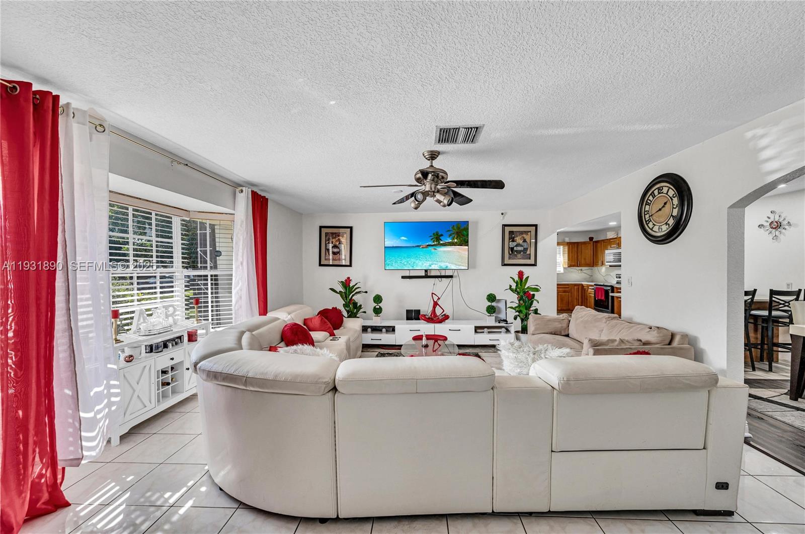 4751 Northwest 5th Court Plantation, FL 33317 - Photo 5 of 34 a living room with furniture and a large window