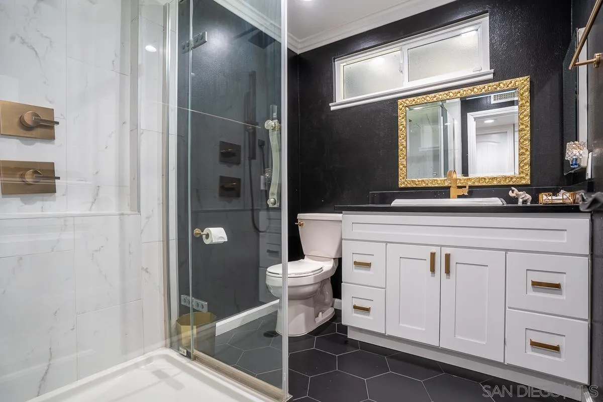 23615 Decorah Road Diamond Bar, CA 91765 - Photo 17 of 42 a bathroom with a sink a toilet and shower