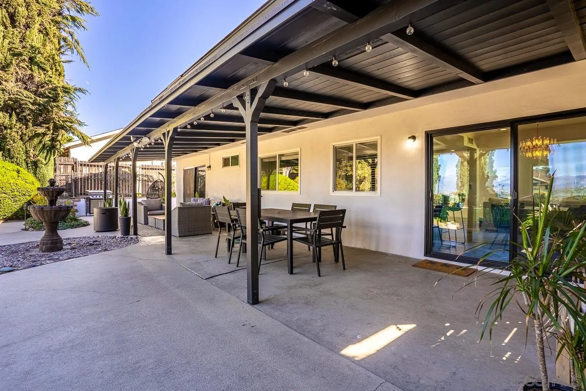 23615 Decorah Road Diamond Bar, CA 91765 - Photo 33 of 42 a view of a porch with table and chairs