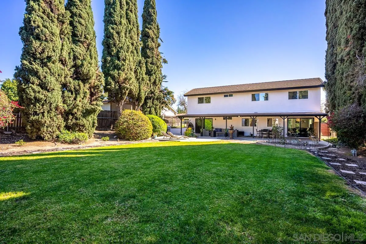23615 Decorah Road Diamond Bar, CA 91765 - Photo 34 of 42 a view of a big house with a big yard and large trees