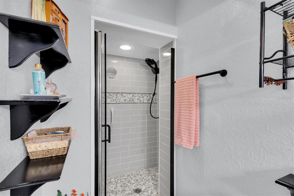 819 10th Street Southwest Largo, FL 33770 - Photo 54 of 85 a bathroom with a sink toilet and shower